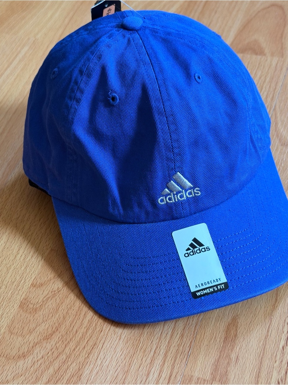 Adidas Sport Essentials Aeroready Baseball Hat in a Bright Blue Color.